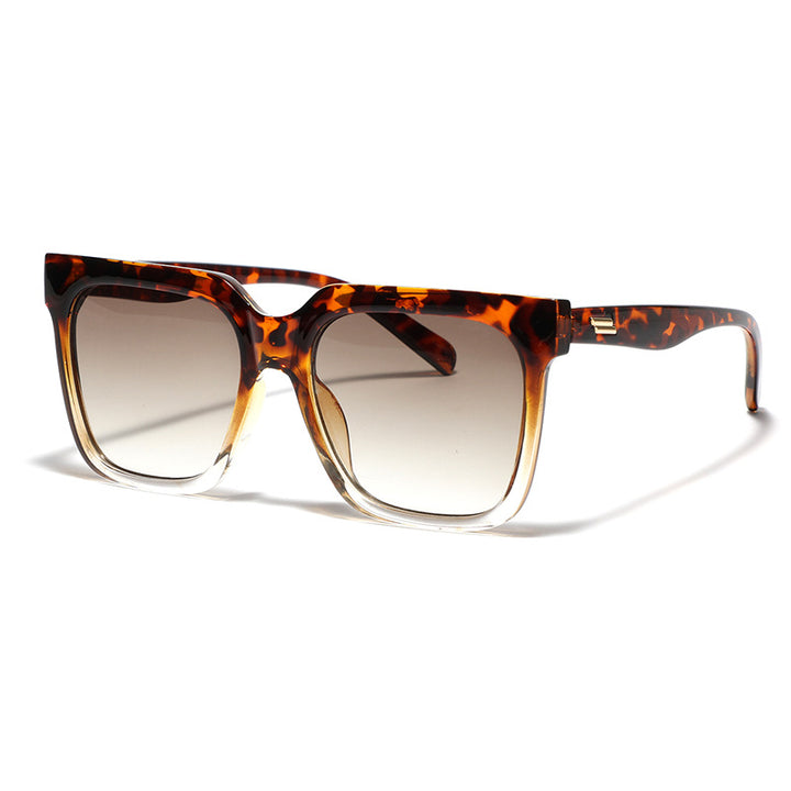 Dame firkantet solbrille med elegant skjoldpadde-design Skanto