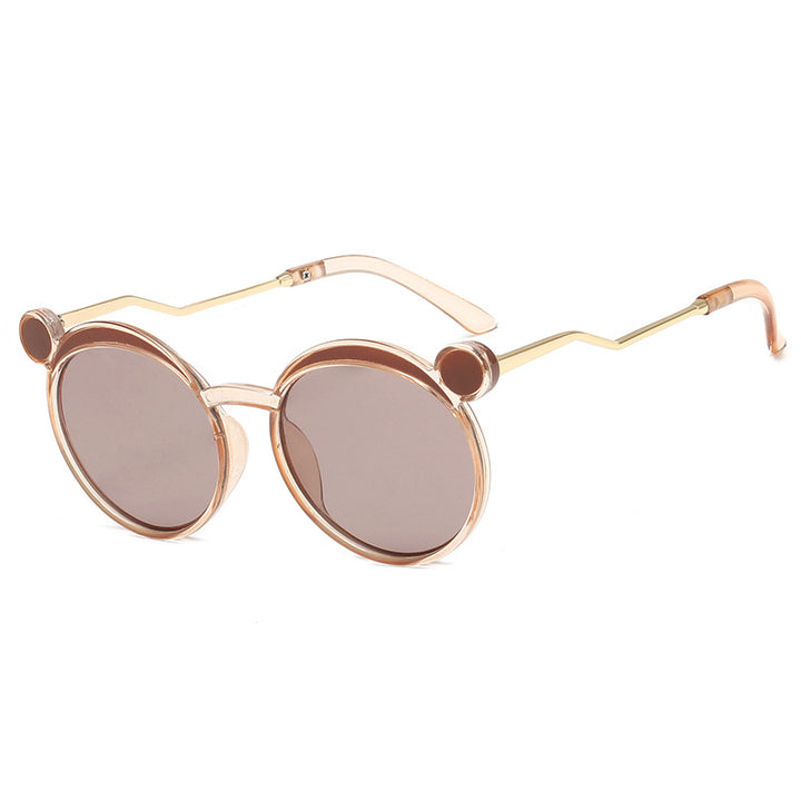 Dame Fashion-runde solbrille med innovativ ramme og fargede linser Skanto