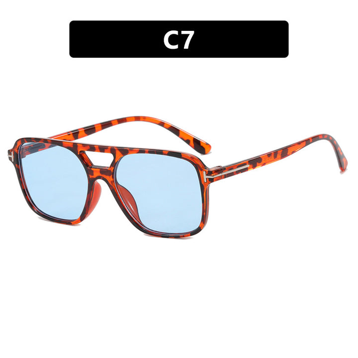 Dame elegant geometrisk solbrille med stilfull ramme Skanto
