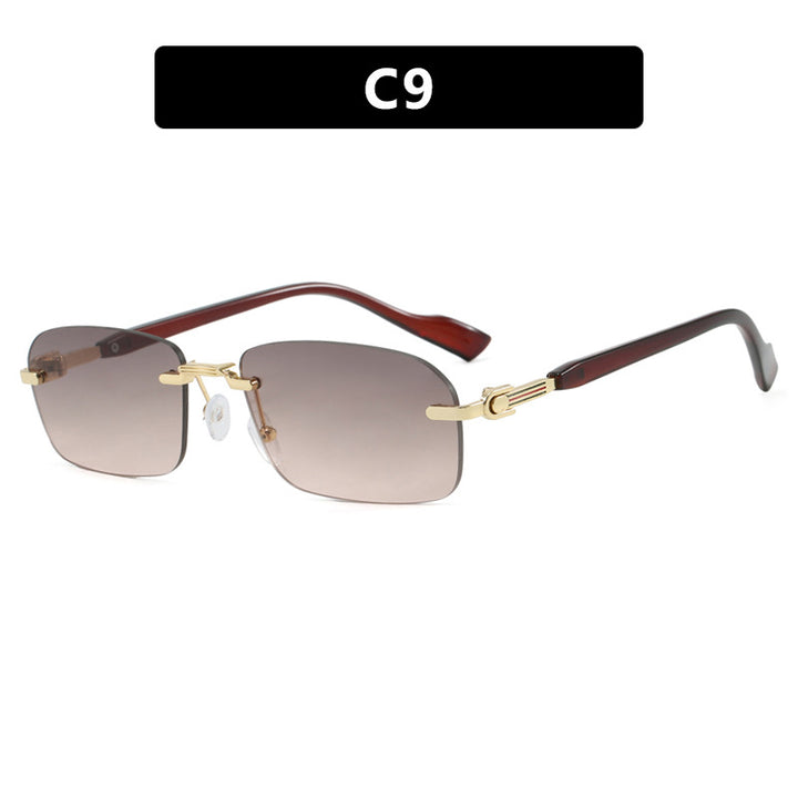 Dame solbrille med elegant metallramme og stilige tre detaljer Skanto