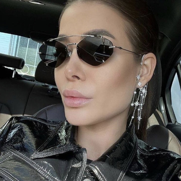 Dame geometrisk solbrille med ultralett metallramme Skanto
