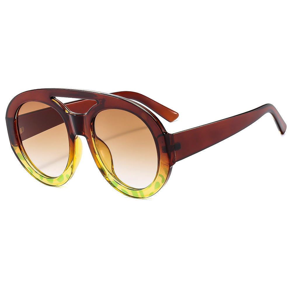 Dame Mote Solbriller i futuristisk oversized-design Skanto