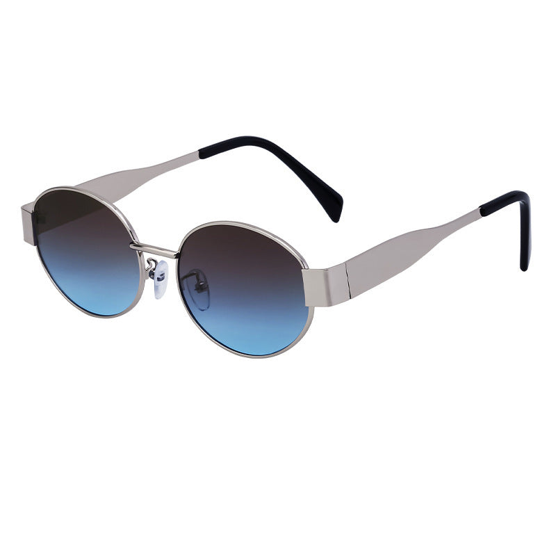 Dame moteriktig solbrille i elegant oval design Skanto