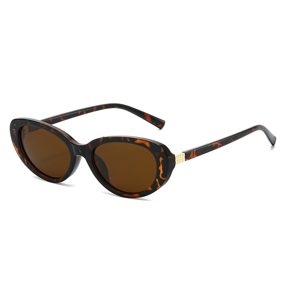 Damer moter solbrille i elegant Cat-Eye-stil Skanto