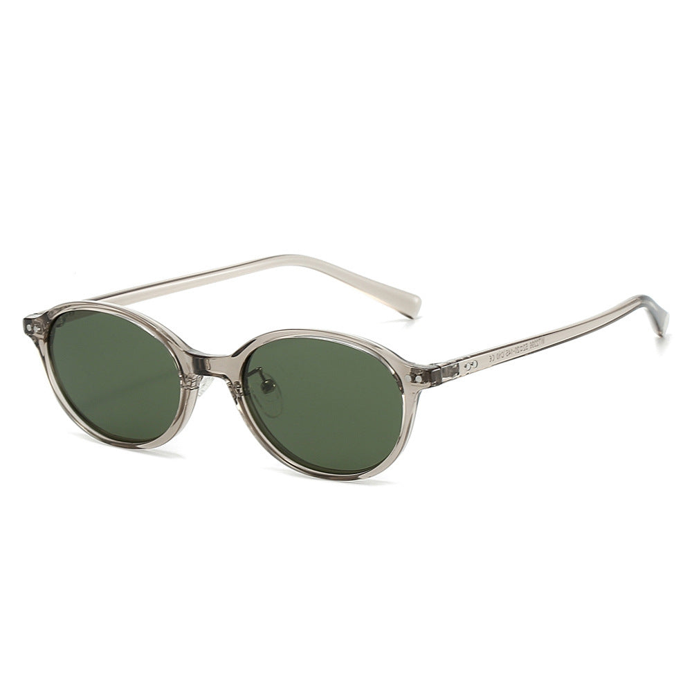 Dame Premium solbrille i elegant oval design Skanto