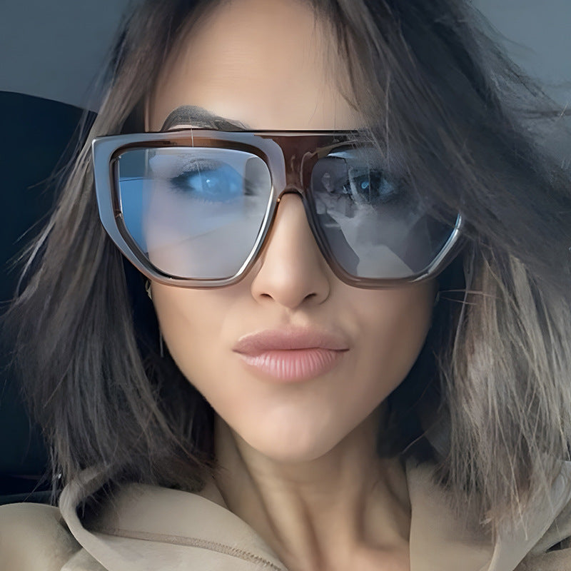 Dame fashionable oversized solbriller med innovativ ramme Skanto