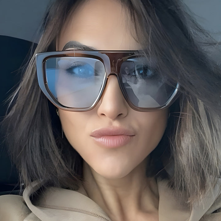Dame fashionable oversized solbriller med innovativ ramme Skanto