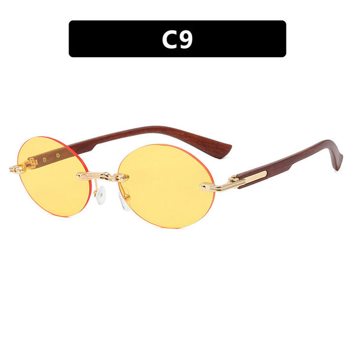 Dame rund solbrille med elegant treinnramme og UV-beskyttelse Skanto