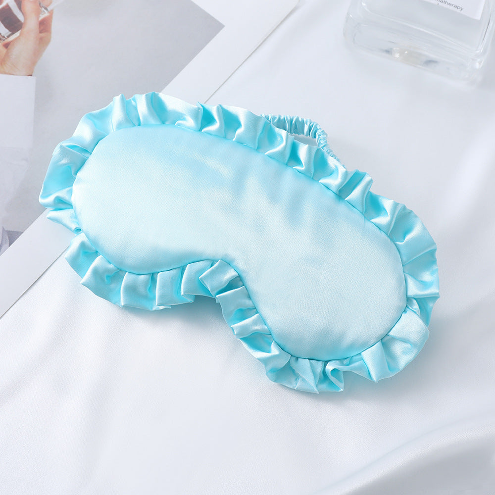 Dame nan satin-glinsende øyemaske med ergonomisk kontur, volangkant og myk polstring Skanto