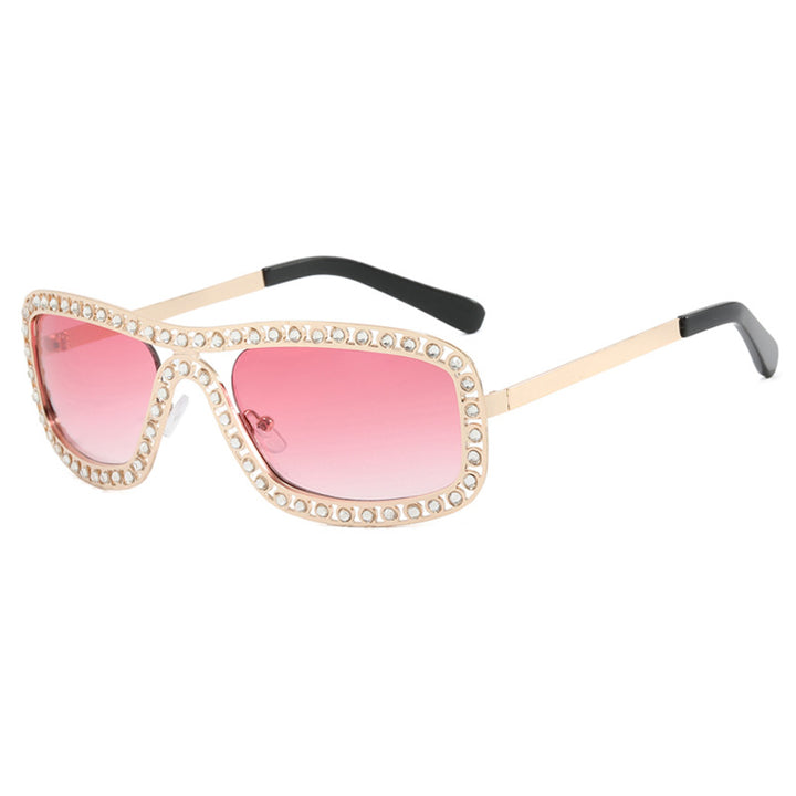 Dame moteriktig solbrille med glitrende ramme Skanto