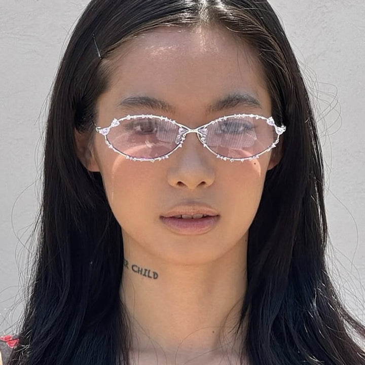 Dame eksklusiv solbrille med glitrende strass-dekor og elegant metallramme Skanto