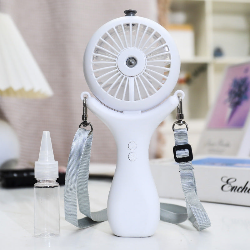 Kvinne bærbar mini håndvifte med sprayfunksjon og ergonomisk design Skanto