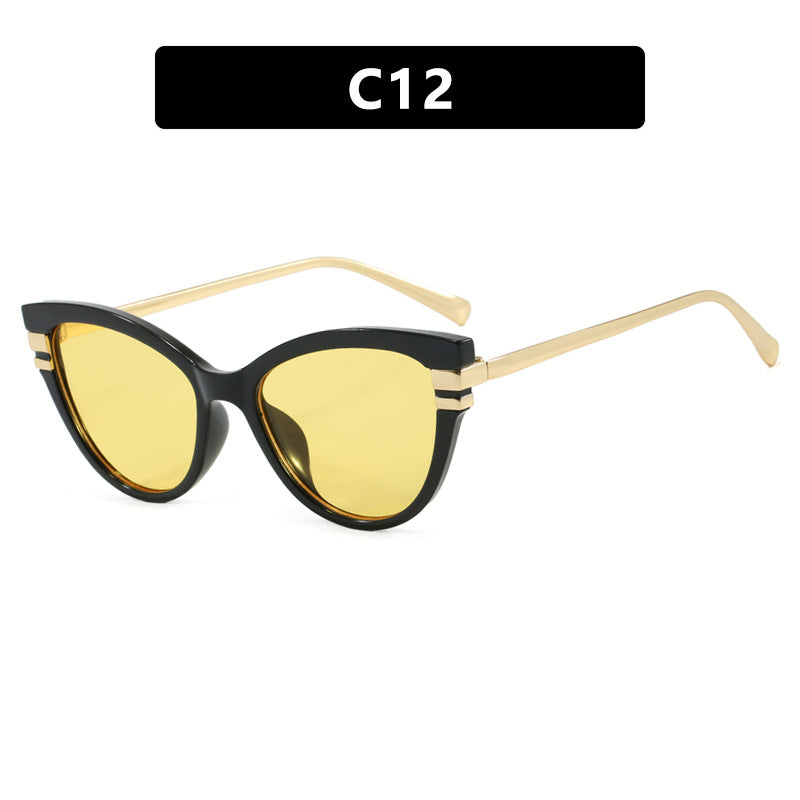 Dame Cat-Eye solbriller med elegant plastramme og gullaccentuer Skanto