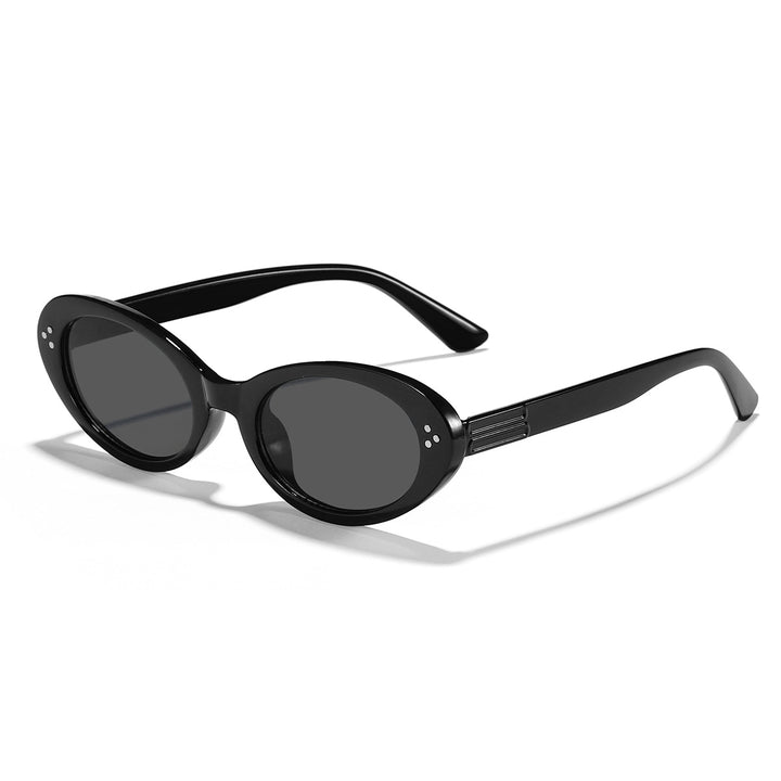 Dame moter solbrille med elegant, oval design Skanto
