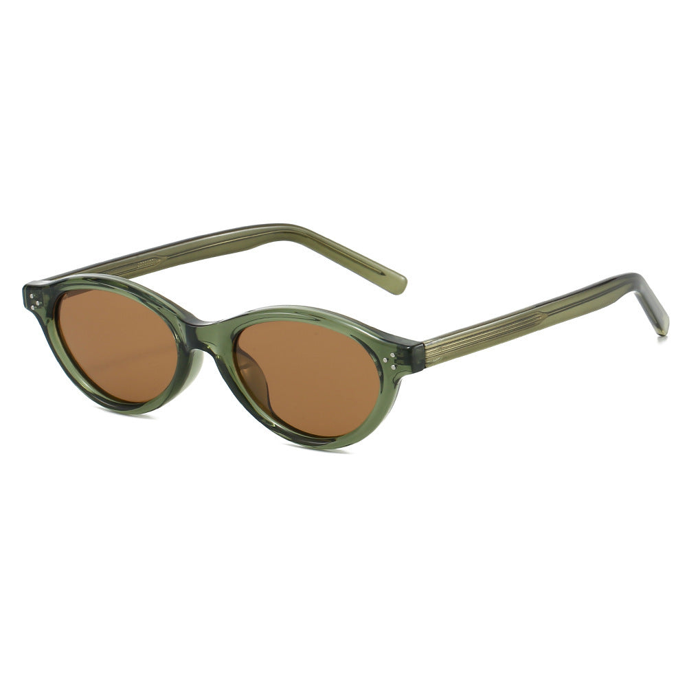 Dame Cat-Eye solbriller med elegant, transparent ramme og UV400-beskyttelse Skanto