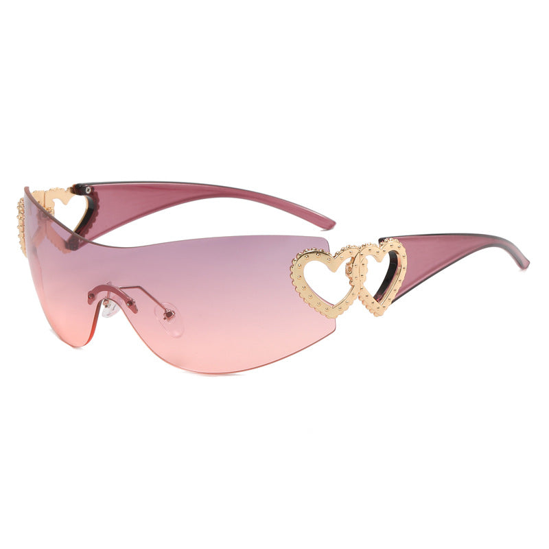 Dame Fashion-solbrille med hjerte-applikasjoner Skanto