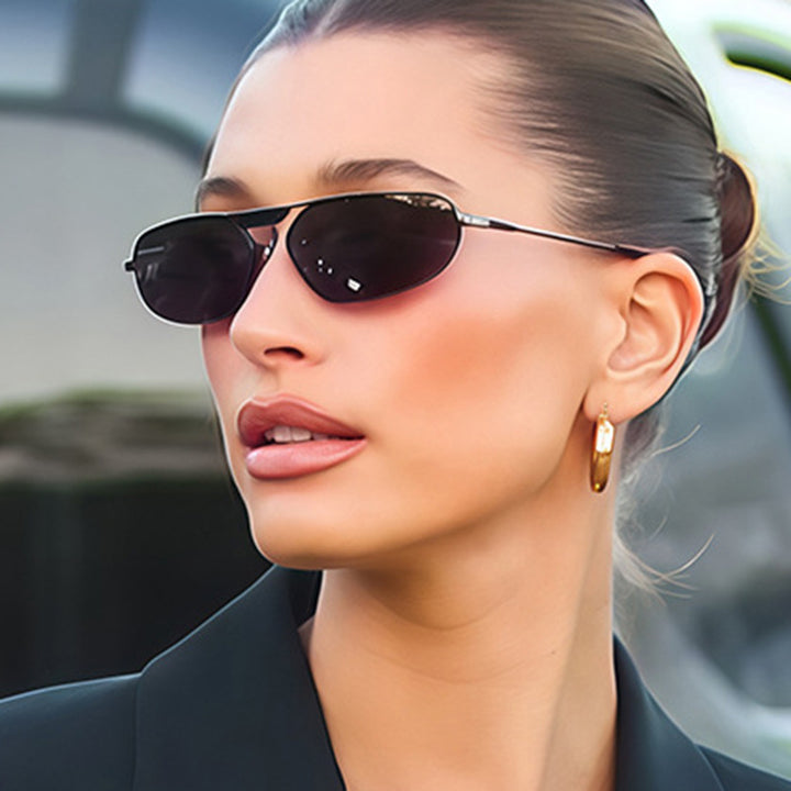 Dame moteriktig solbrille i elegant polygon-design Skanto