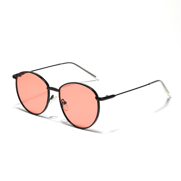 Dame rund solbrille med smal metallramme og polariserte linser Skanto
