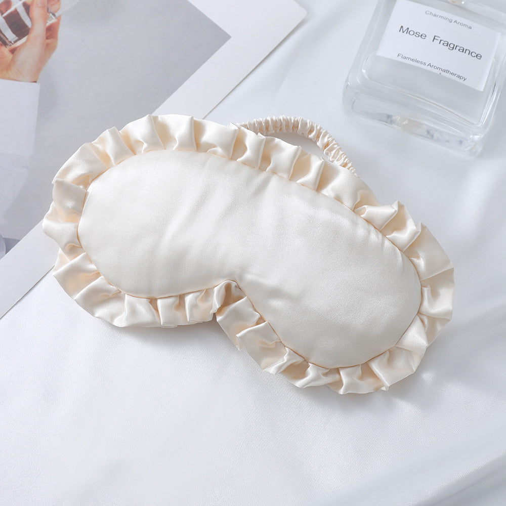 Dame nan satin-glinsende øyemaske med ergonomisk kontur, volangkant og myk polstring Skanto