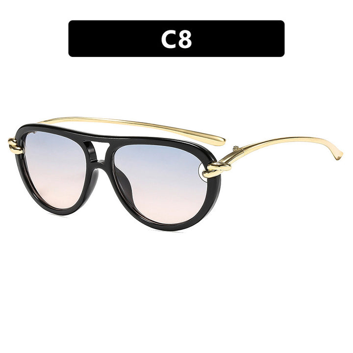 Dame Retro-solbrille med elegant ramme og polariserte linser Skanto