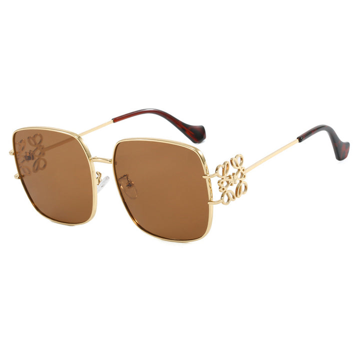 Dame kvadratisk solbrille med filigran design og luksuriøs metallramme Skanto