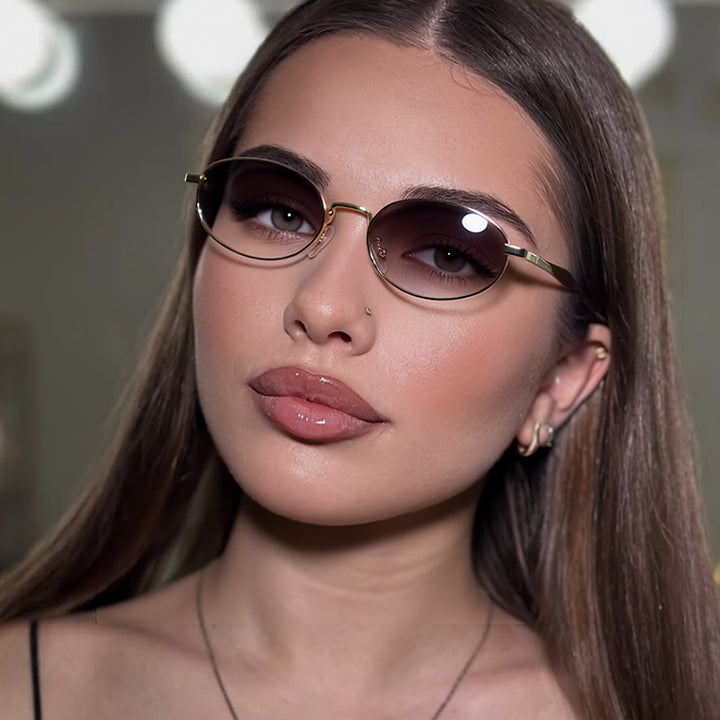Dame robust rund solbrille med speilglass Skanto