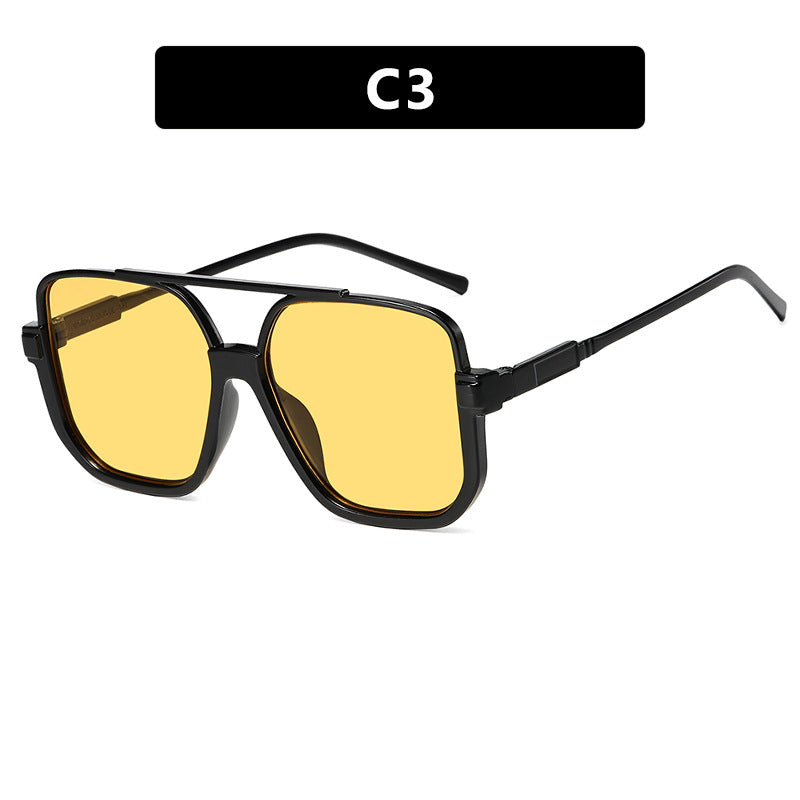 Dame kvadratisk solbrille med gjennomsiktig ramme og grønntonet glass Skanto