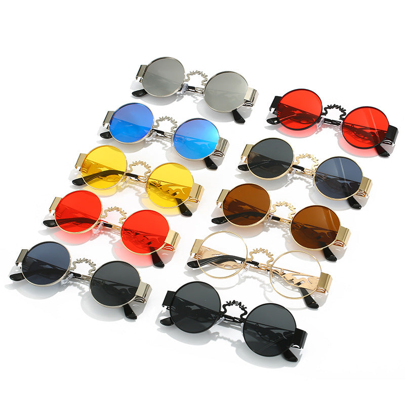 Dame kunstnerisk rundt solbrille med elegant filigranramme Skanto