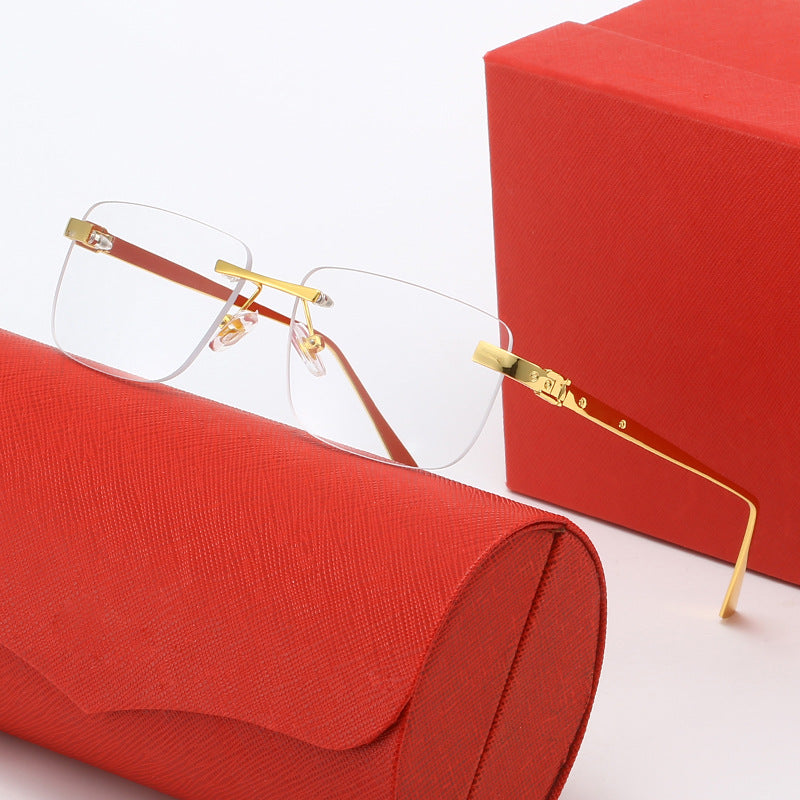 Dame moteriktig halvrandsbrille med elegant metallramme Skanto