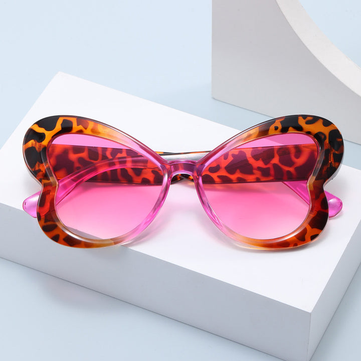 Dame Oversized-solbrille i leken sommerfugl-design Skanto