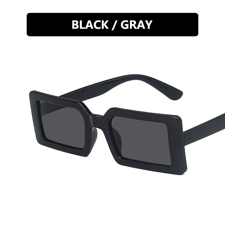 Dame kvadratisk solbrille med moderne, bred ramme og beskyttende UV-filter Skanto