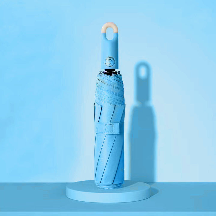 Dame elegant foldes regnparaply med ergonomisk håndtak og UV-beskyttelse Skanto