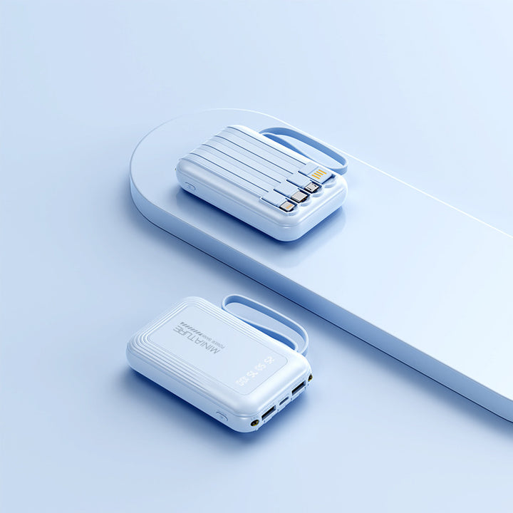Praktisk Powerbank med trådløs hurtiglading og integrert kabelsystem Skanto