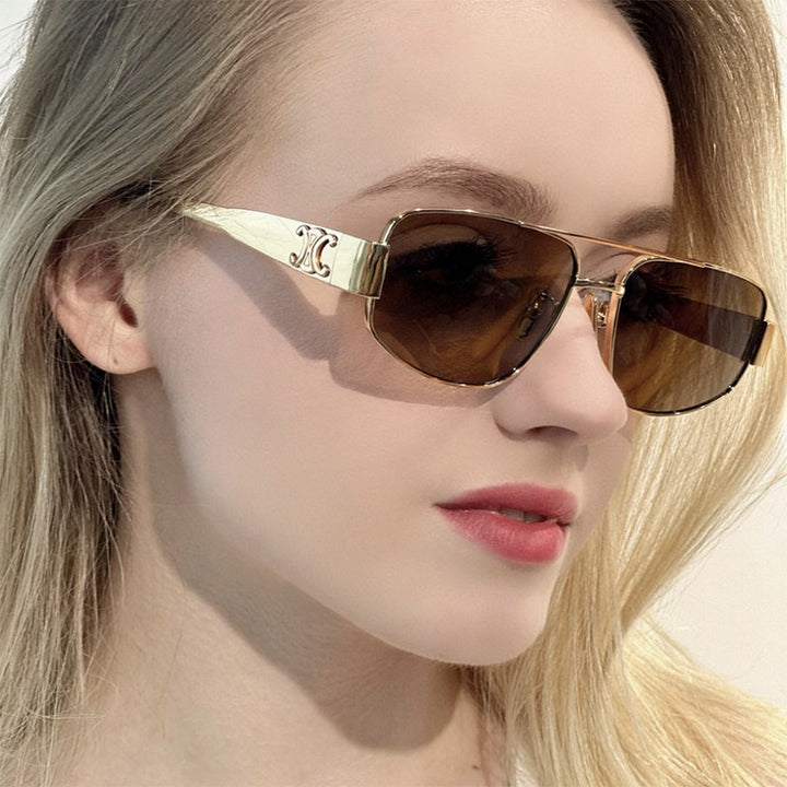Dame solbrille med elegant og sporty design Skanto