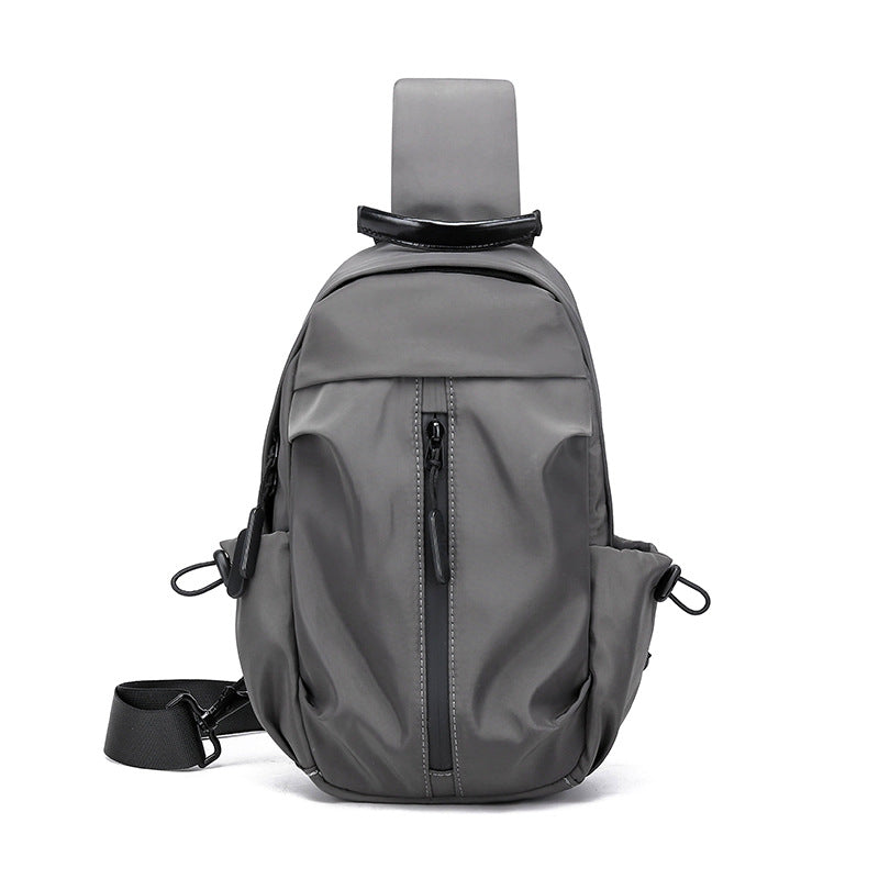 Sling-veske med multifunksjonelt design Skanto
