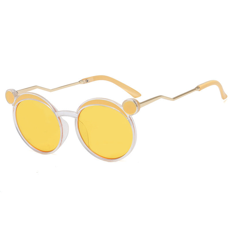 Dame Fashion-runde solbrille med innovativ ramme og fargede linser Skanto