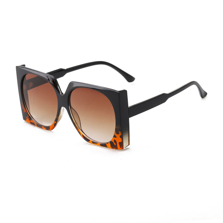 Dame Oversized solbriller i elegant ramme Skanto