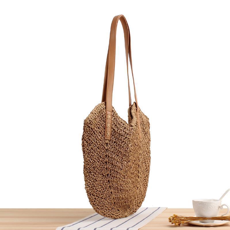 Large straw bag with leather accents Skanto