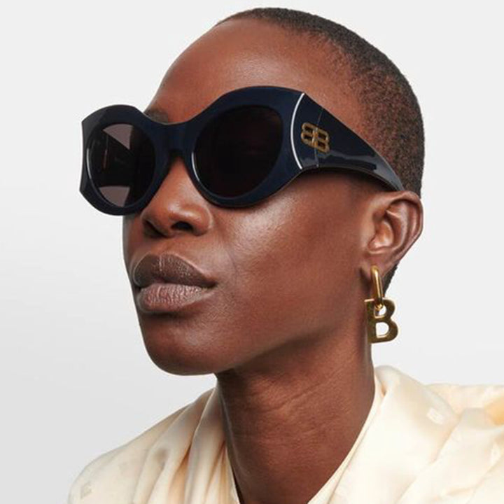Damer stilige Cat-Eye solbriller med høyglansdesign og beskyttende glass Skanto