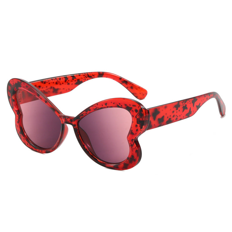Dame Oversized-solbrille i leken sommerfugl-design Skanto