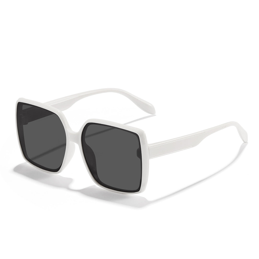 Dame oversized solbrille med moderne kvadratisk ramme og beskyttende glass Skanto