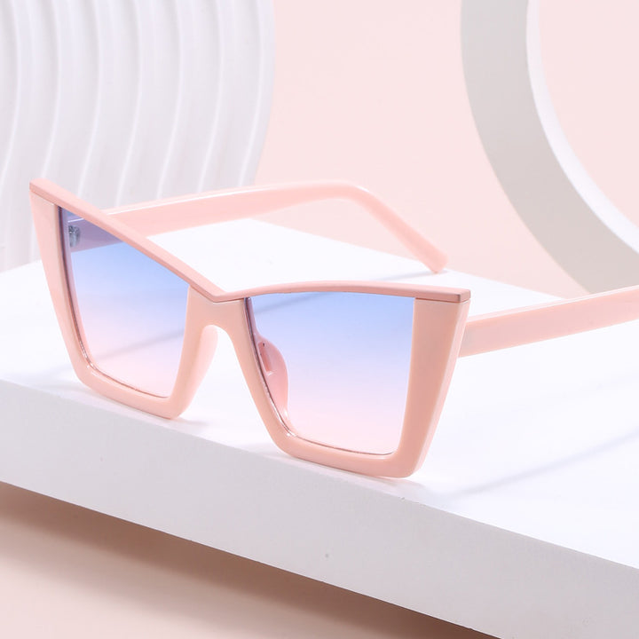 Dame firkantet solbrille med gullige detaljer Skanto