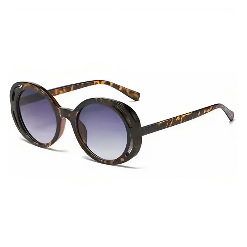 Dame Ovalformet Designer-solbrille med klassisk detalj Skanto