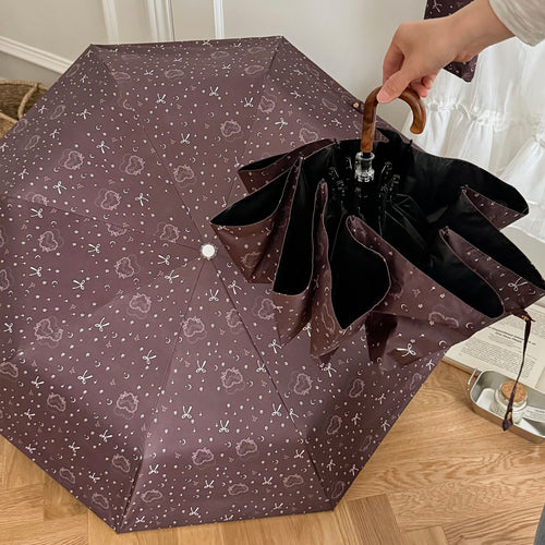 Dame sammenleggbart regnparaply med elegant anhengdesign Skanto