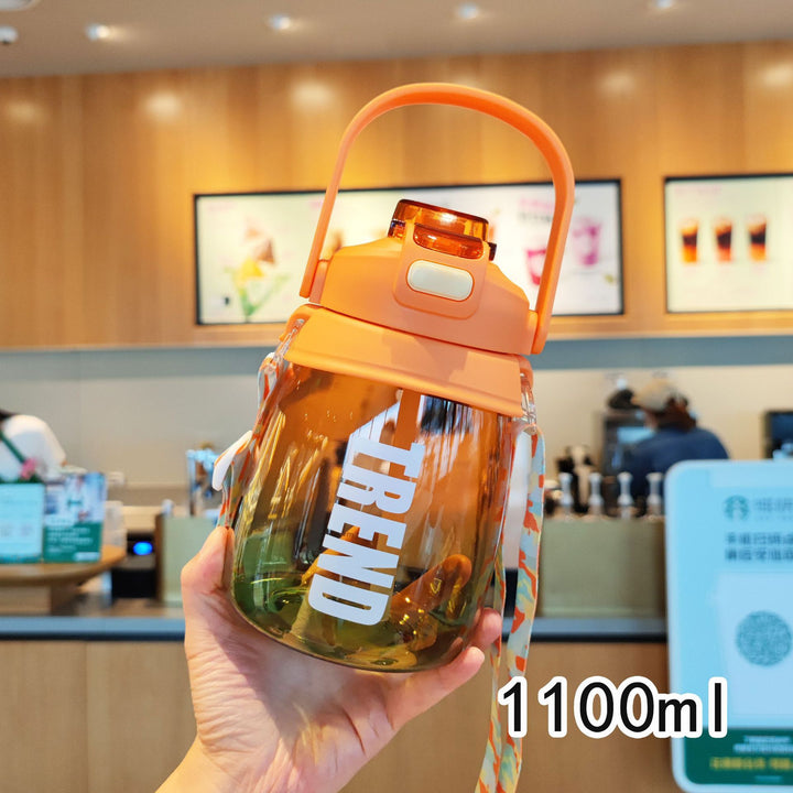 Dame multifunksjonell drikkeflaske med sikkerhetslås og ergonomisk bærehåndtak Skanto