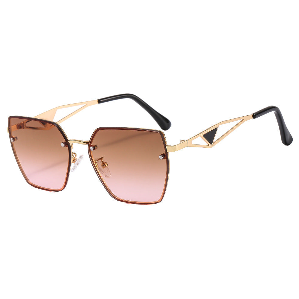 Dame geometrisk solbrille med filigran design Skanto