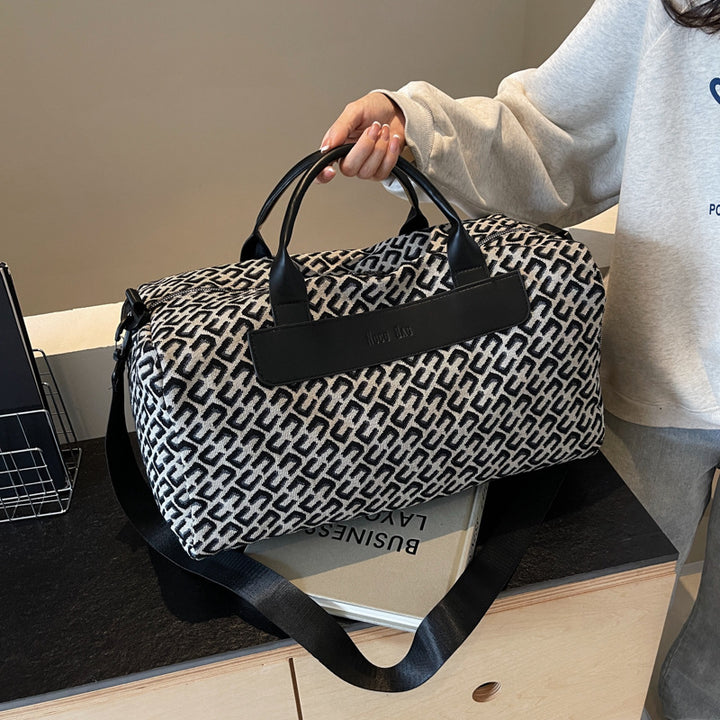 Sportlig Duffelbag Med Holdbart Material Og Praktiske Rom