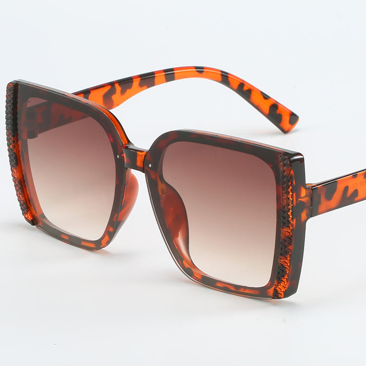Dame oversized Designer-solbriller i moderne flettet design Skanto
