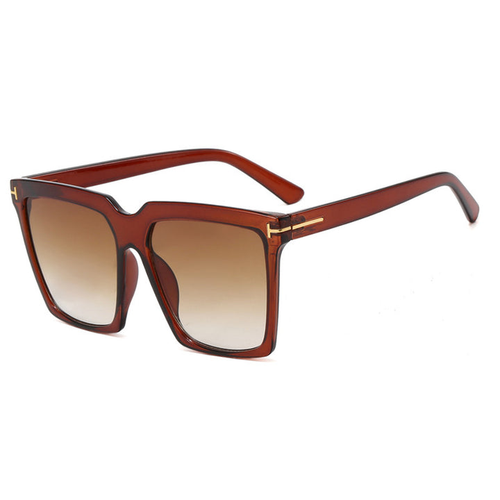 Dame oversized solbriller med elegant og polariserende glassdesign Skanto
