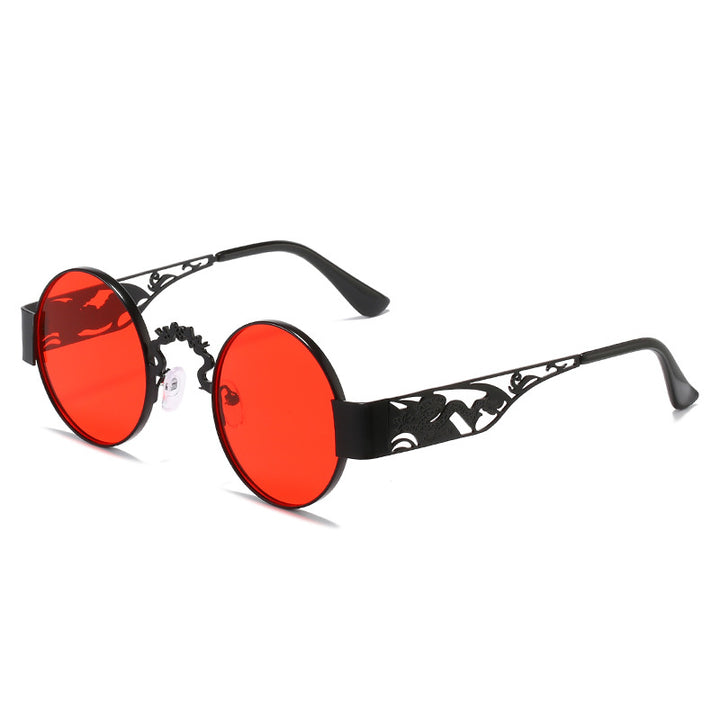 Dame kunstnerisk rundt solbrille med elegant filigranramme Skanto